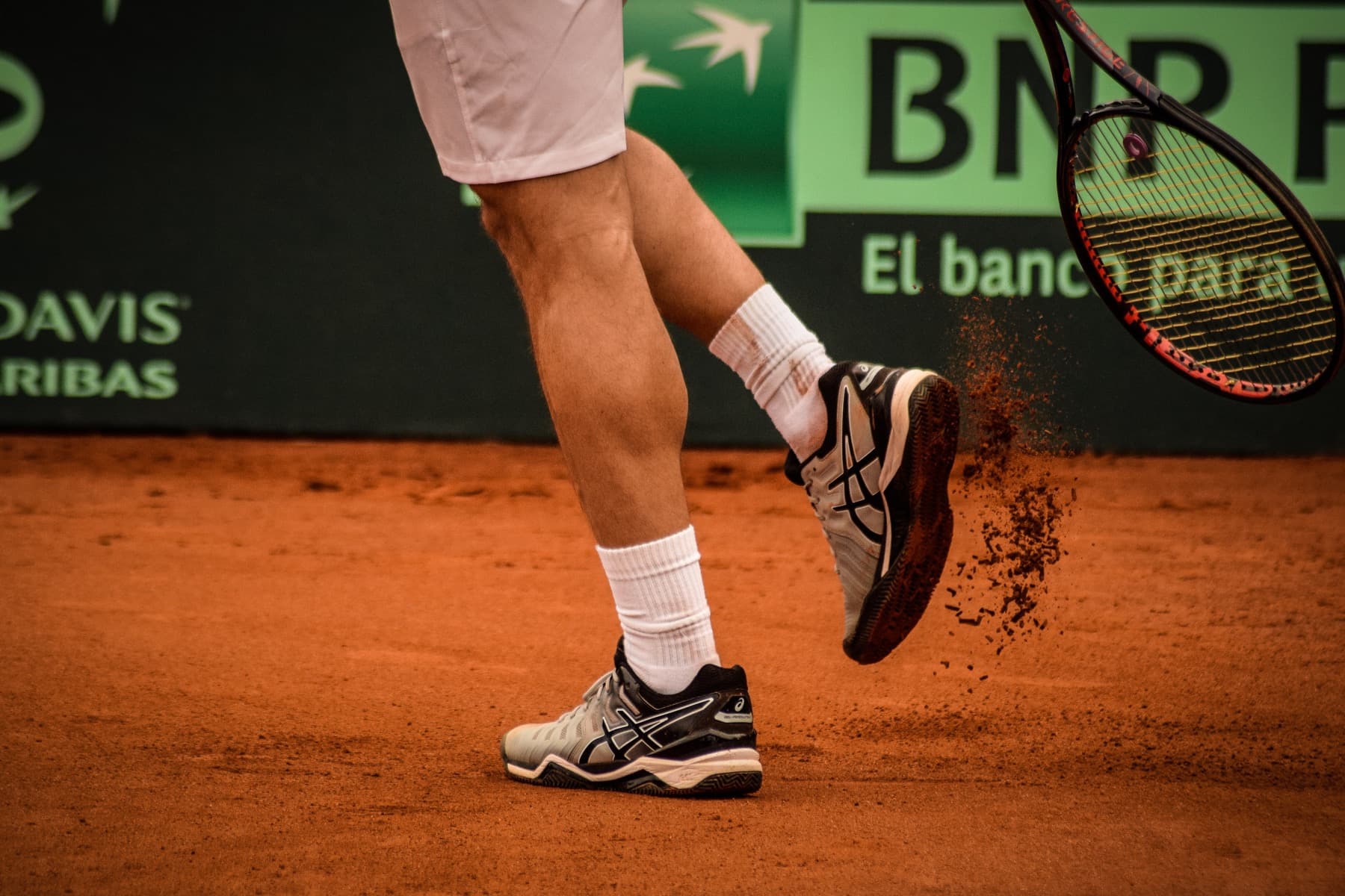 Athlete footwork on a tennis court